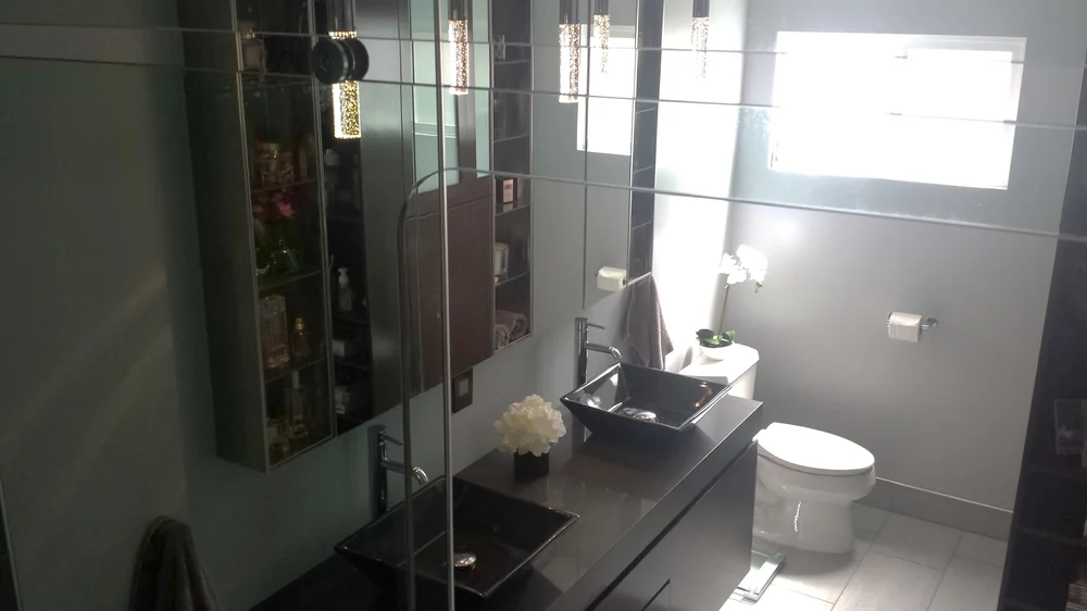 Mirror-walled powder room