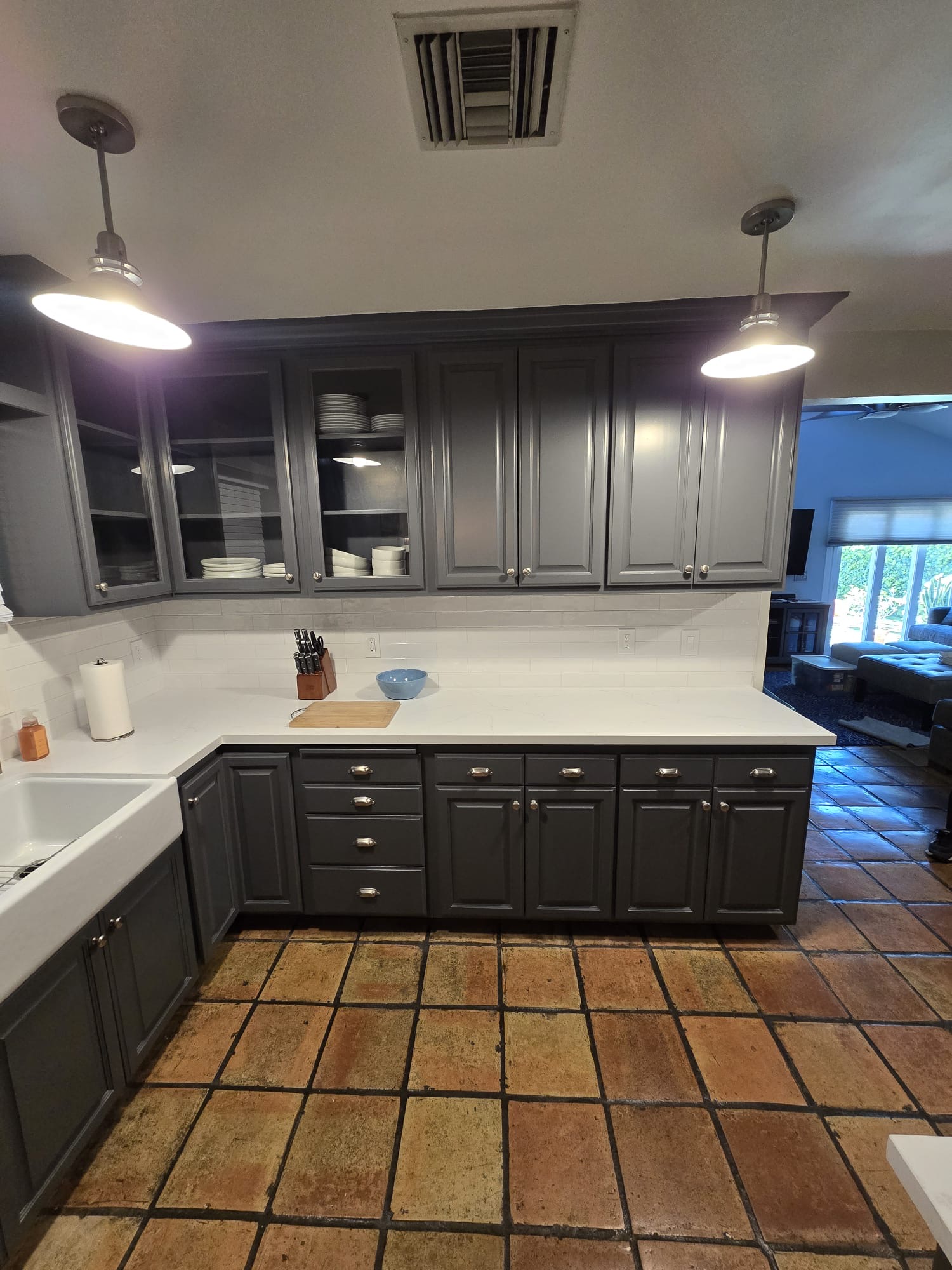 Subway tile over farmhouse sink