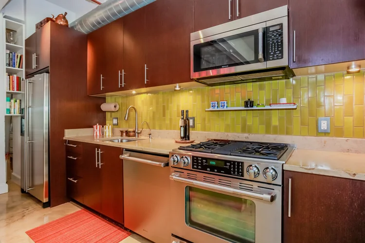 Mahogany cabinets & yellow tile