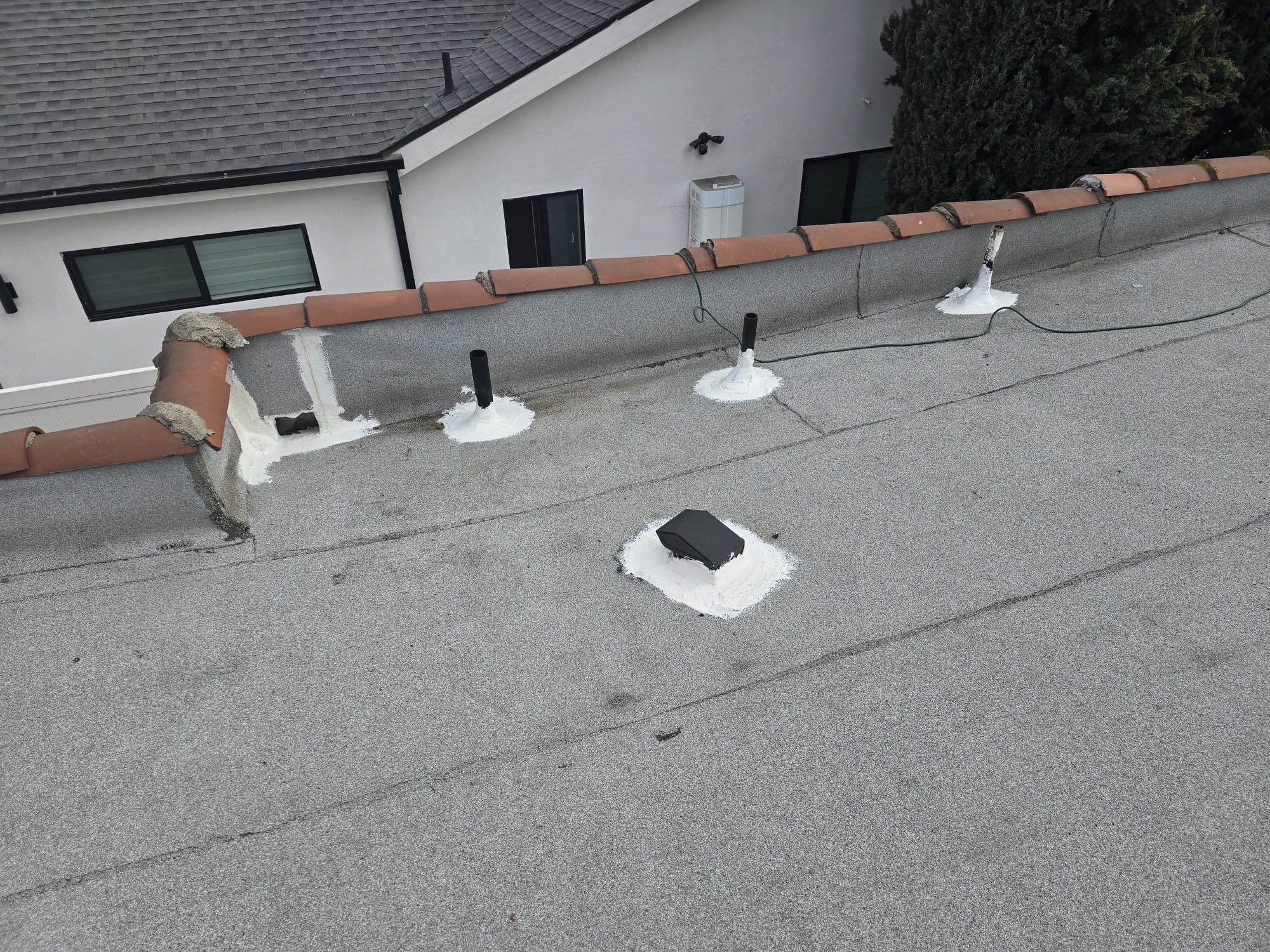 Flashed roof penetrations and scuppers