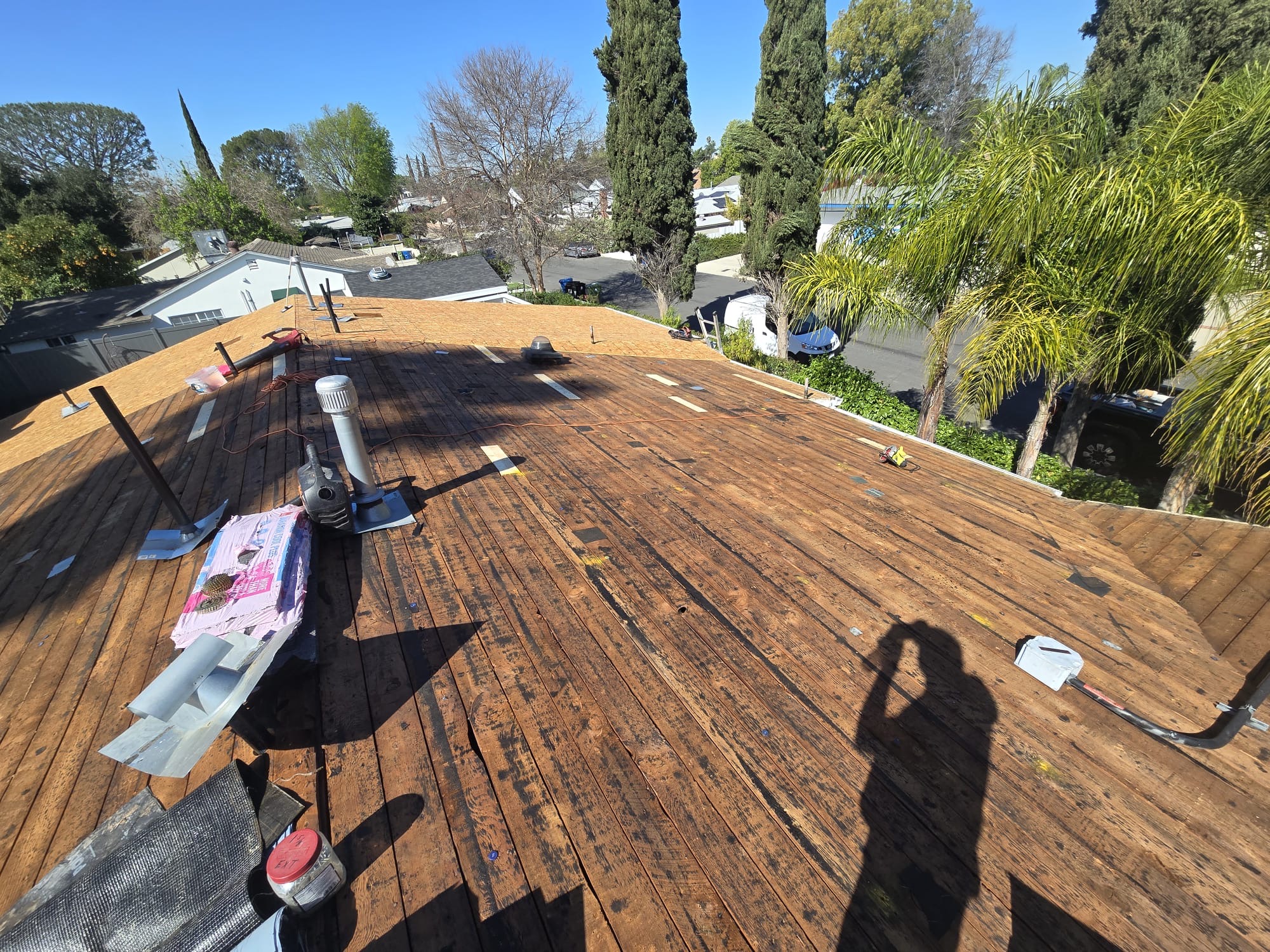 Exposed plank decking re-roof